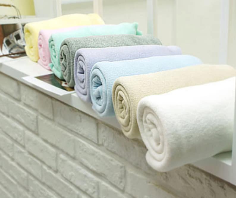 Какие бывают полотенца. Ткань для полотенец. Современные полотенца. Махровая ткань. Разновидности полотенец.