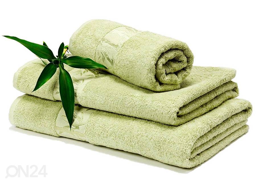Бамбуковые полотенца. Салатовое полотенце. Зеленое полотенце. Стопка полотенец. Полотенце корень