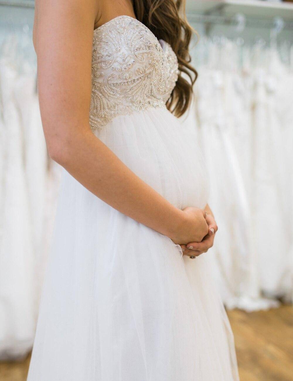 Свадебные платья для беременных: какое выбрать и как скрыть живот?